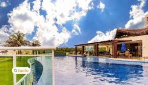Apartamento nascente moderno no condomínio familiar Riviera Beach Place por Tactu